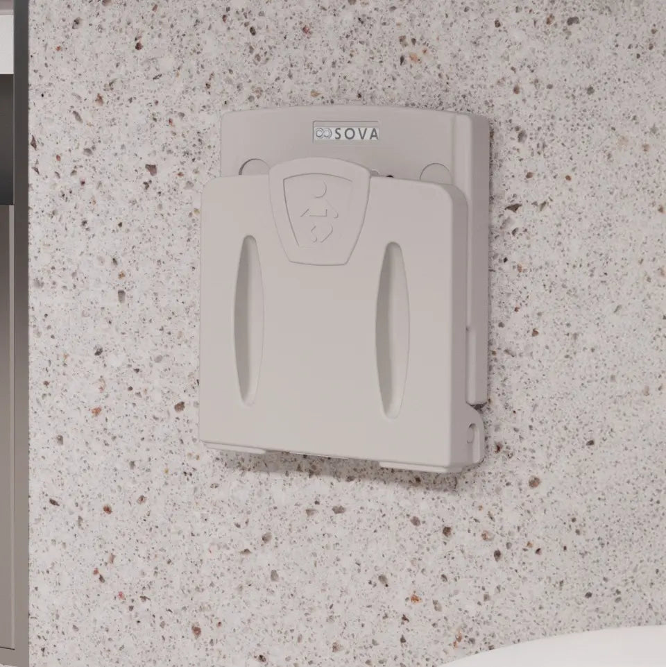 Sova Toddler wall-mounted seat on marble wall