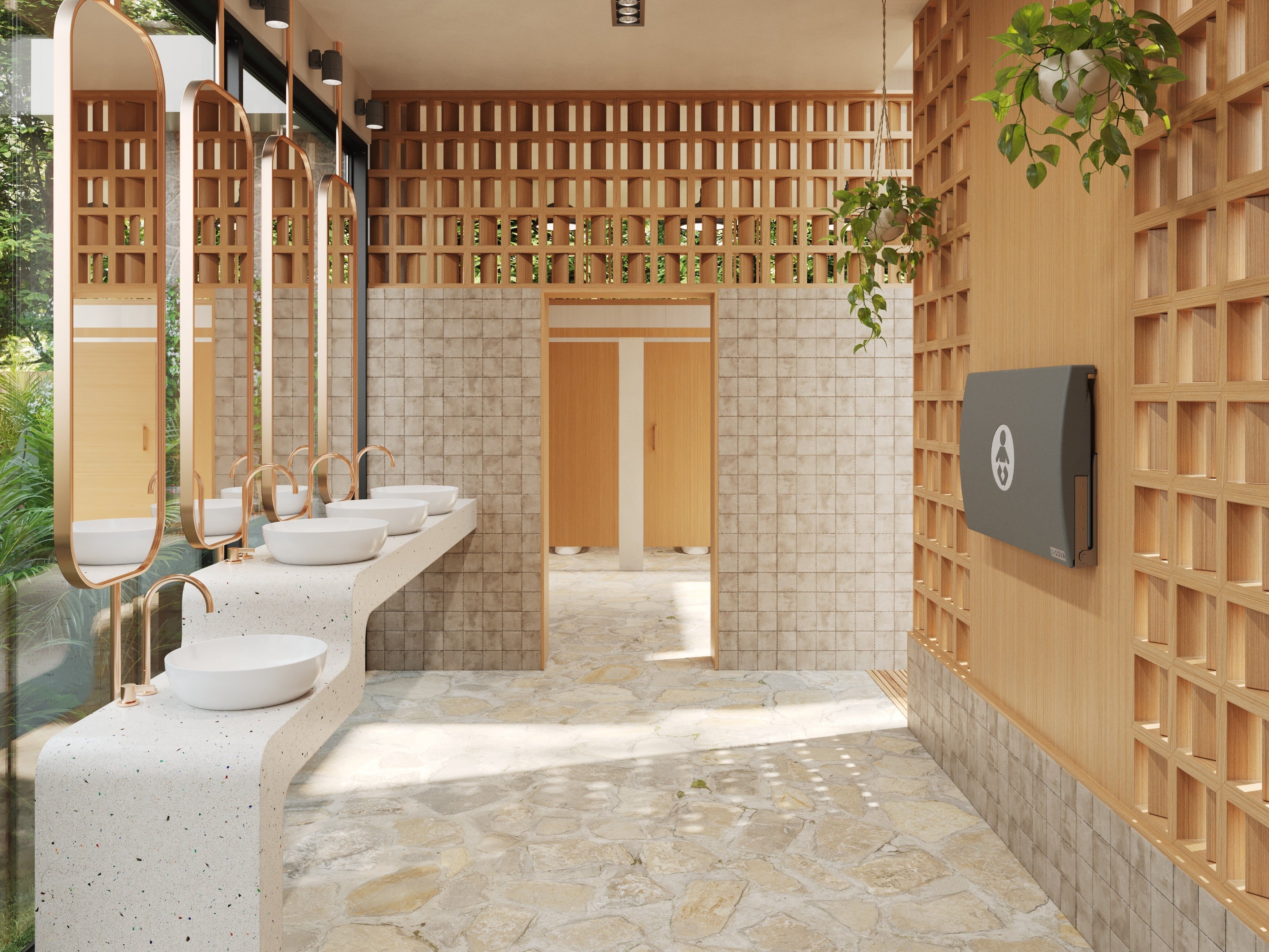 a gray wall mounted baby changing station in a public restroom