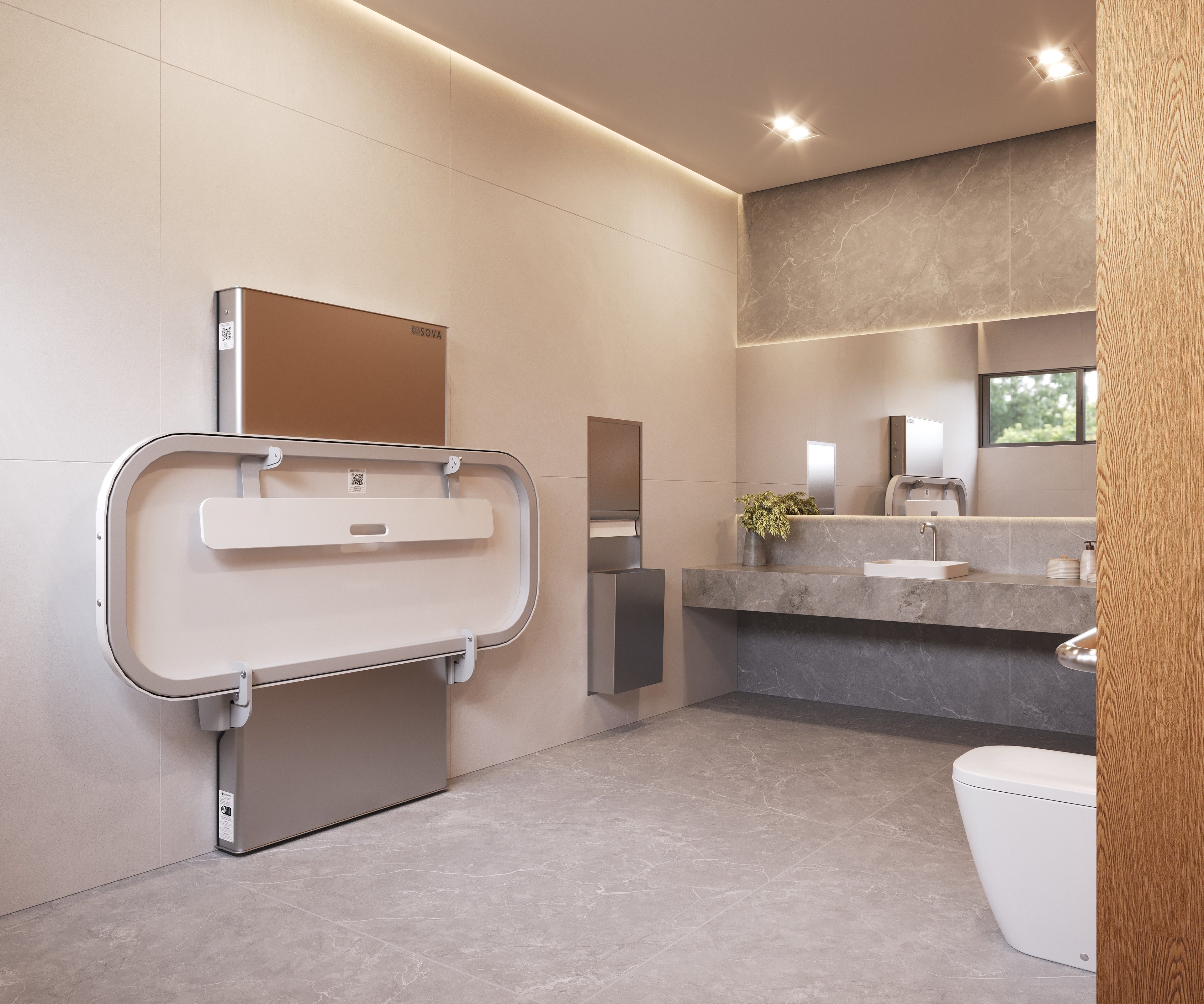 Sova Ascent 70 Universal Changing Table in a folded position in a modern restroom