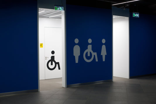 Accessible bathroom entrance with signage.