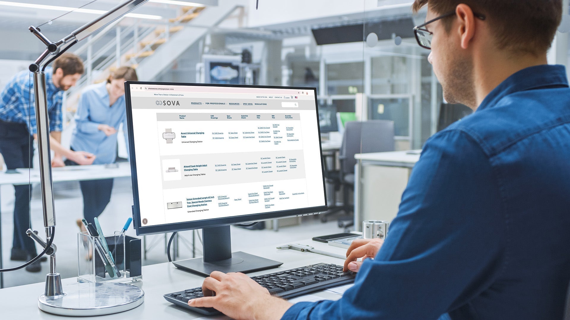 Architect specifying designs at a computer