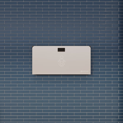 Aura Horizontal Baby changing station mounted on brick wall