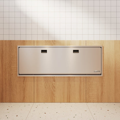 Stainless steel solace extended changing station mounted in bathroom