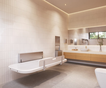 Attend Adult Changing Table mounted open in a modern bathroom