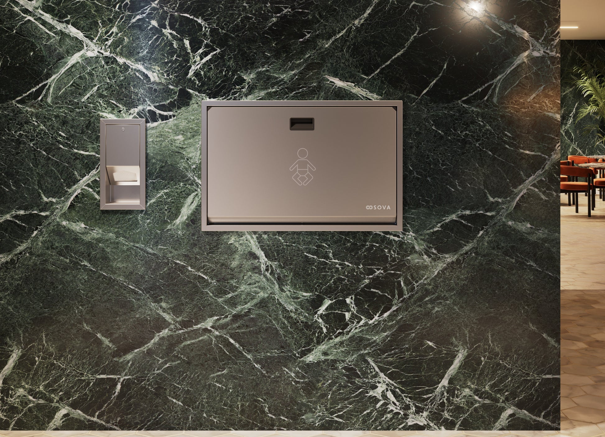 Sova Baby Changing Station with Liner Dispenser mounted on marble wall 