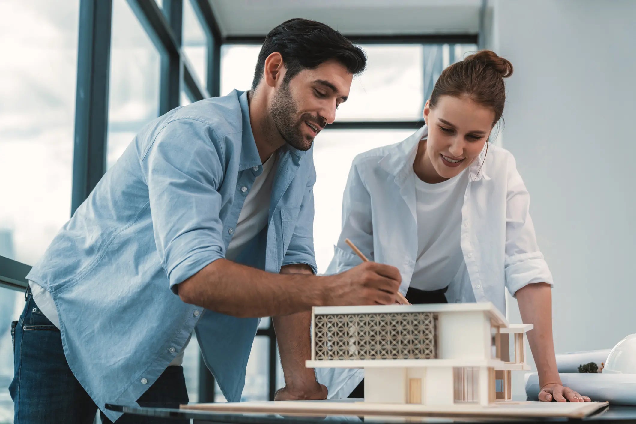 Two architects working on accessible bathroom plans